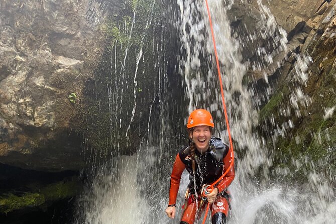 Adrenaline Canyoning Kelowna - Rappelling waterfalls and sliding over rock