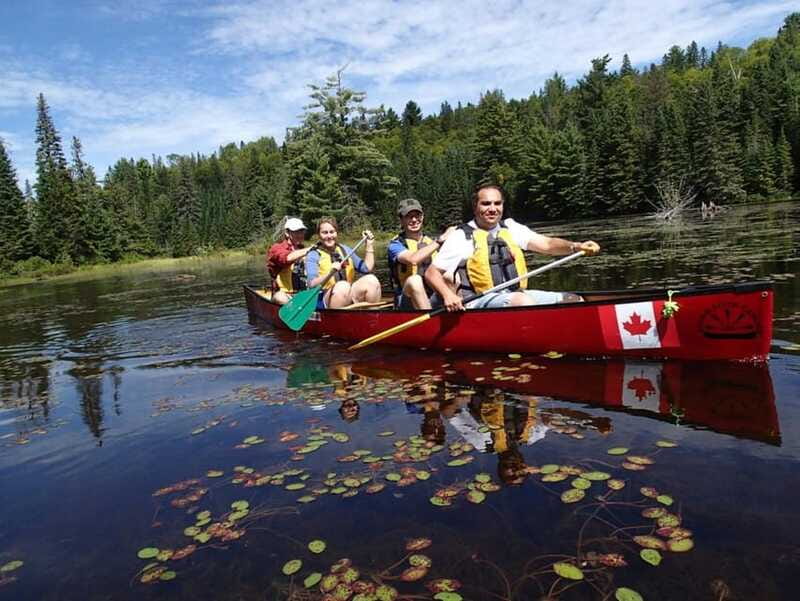 Algonquin Park: Guided Canoe Day Tour - Cliff jumping with room to choose your limit