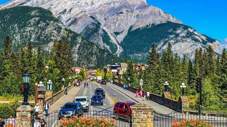 Banff: Gondola, Hot Springs, Bow falls & Three lakes tour - Banff Avenue and the town’s mountain character