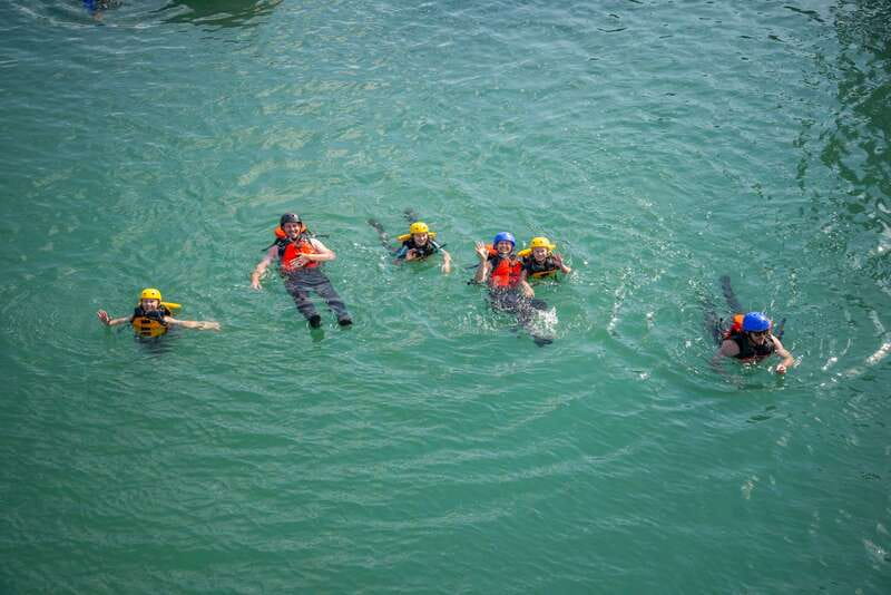 Banff: Kananaskis River Whitewater Rafting Tour - Getting dressed for cold Canadian water