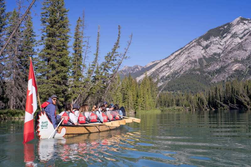 Banff: Wildlife on the Bow River Big Canoe Tour - Paddling upstream beneath Banff’s mountain views