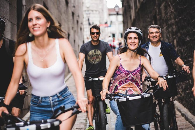 Bike / E-bike Tour : Downtown, Old Montreal, Waterfront by Fitz - Old Montreal, cobblestones, and Notre-Dame Basilica