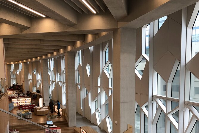 Calgary City Tour: Peace Bridge, Calgary Tower & Stephen Avenue - City Hall adds Calgary’s sandstone past