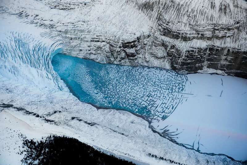 Canadian Rockies: Abraham Lake Ice Bubbles Helicopter Tour - Landslide Lake turns sightseeing into a winter outing