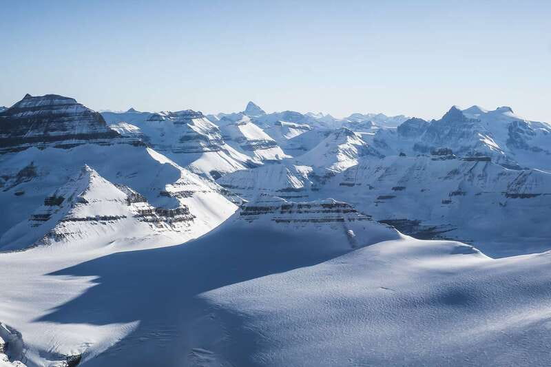 Canadian Rockies: Abraham Lake Ice Bubbles Helicopter Tour - The distance from Banff changes the value calculation