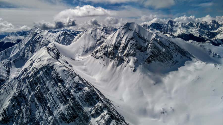 Canmore: 25-Minute Three Sisters Helicopter Tour - Through Three Sisters Pass into Spray Valley