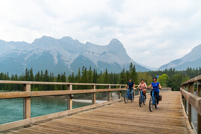Canmore’s #1 Food Bike Tour: A Must Do Mountain Experience! - Three Sisters views on the way to lunch