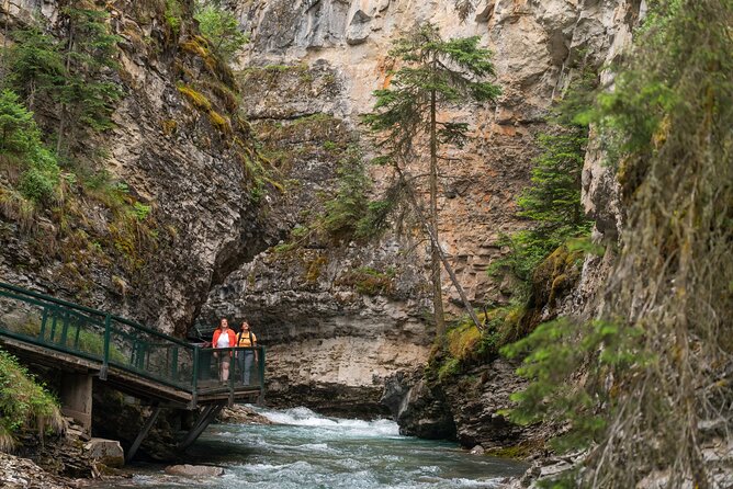 Day Tour to Banff Gondola Johnston Canyon Hiking Cave Basin - Lake Minnewanka closes the day with open water and mountain views
