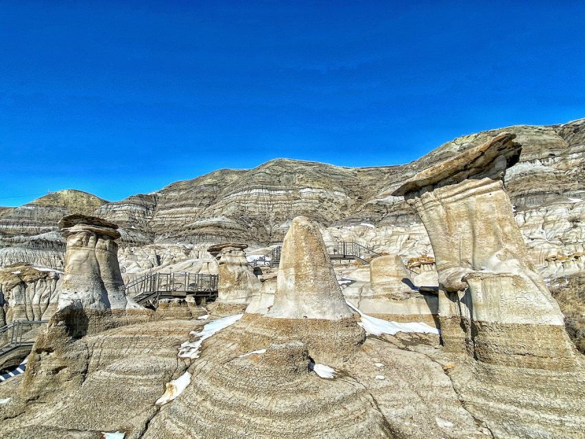 Drumheller: Bad Land & Dinosaur Museum Tour from Calgary - Hoodoos Trail and the area’s stone pillars