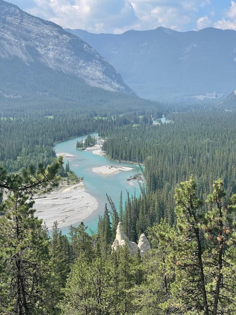 From Calgary: Banff, Moraine Lake and Lake Louise Tour - The Banff Viewpoint and Hoodoo Trail add scale