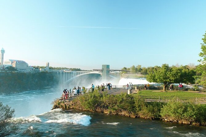 From Toronto: Niagara Falls Day Tour with Optional Boat Cruise - Skylon Tower, Journey Behind the Falls, and Clifton Hill