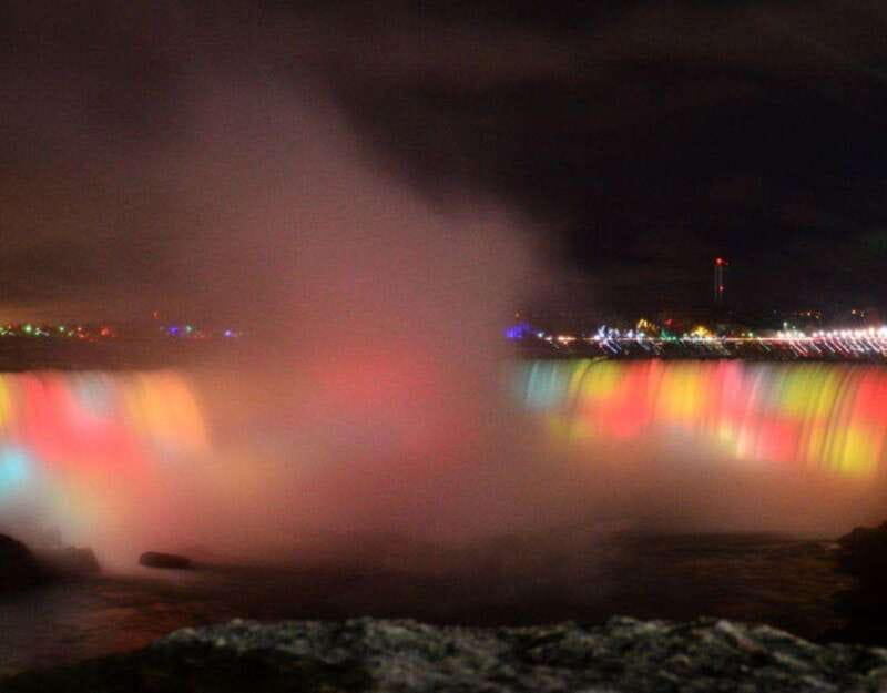 From Toronto: Niagara Falls Tour with Journey & Dinner - Clifton Hill after sunset