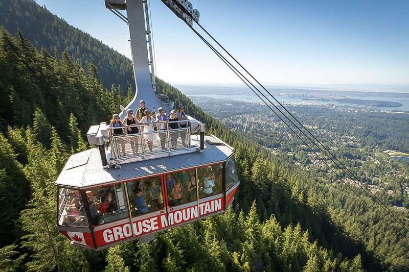 From Vancouver: Capilano Suspension Bridge & Grouse Mountain - Crossing Capilano Suspension Bridge