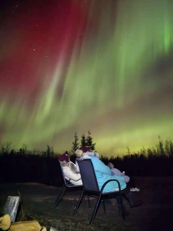 From Yellowknife: Aurora Borealis Tour with Cozy Cabin Base - Fish chowder, bannock, and hot drinks