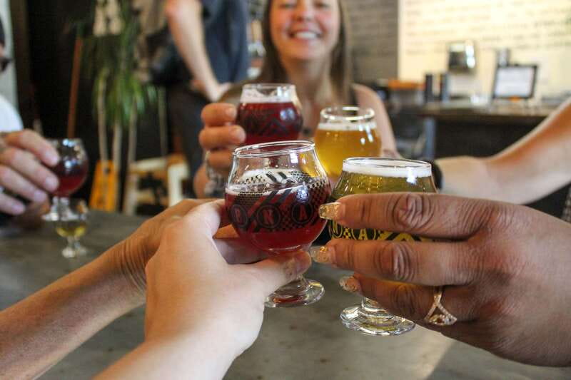 Kelowna: Walking Food Tour with 7 Tastings and 4 Drinks - Kasugai Gardens and public art along the way