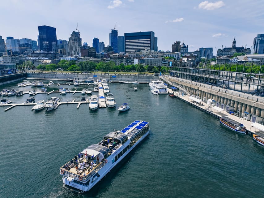 Montreal: Le Bateau-Mouche St. Lawrence Sightseeing Cruise - Jacques Cartier Bridge and the working St. Lawrence