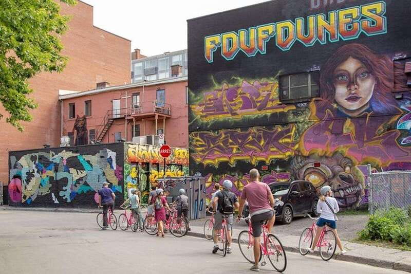 Montreal: Non Touristy Pink Bike Tour - Parks and street art bring the city closer