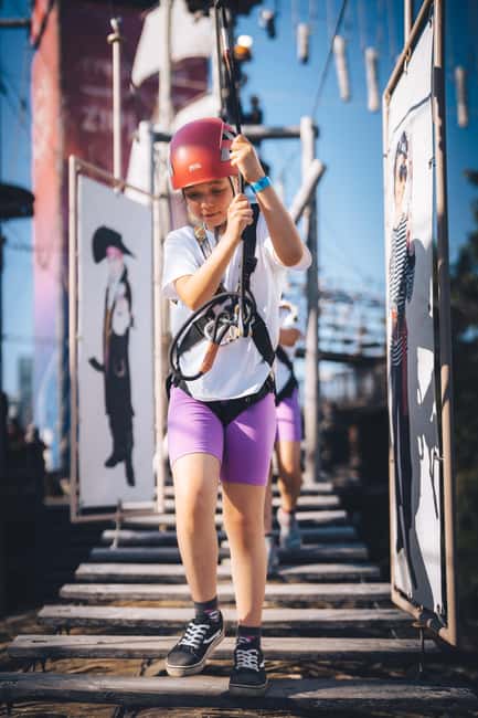 Montreal: Voiles En Voiles Aerial Park Admission Ticket - A climbing wall, carousel, and giant inflatables
