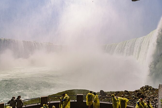 Niagara Falls Boat Ride VIP Boarding & Journey Behind the Falls - Walking the Canadian boardwalk