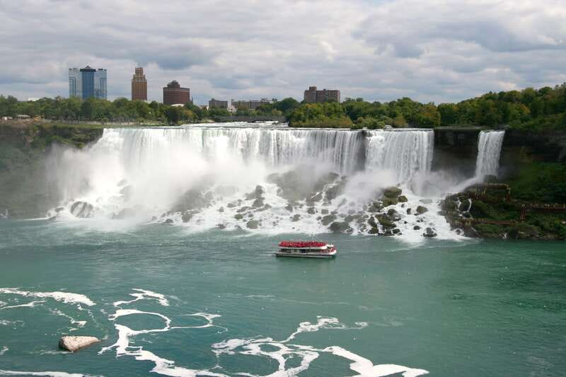 Niagara Falls: Day & Night Tour with Boat Ride and Dinner - Lighting Niagara Falls from the control room