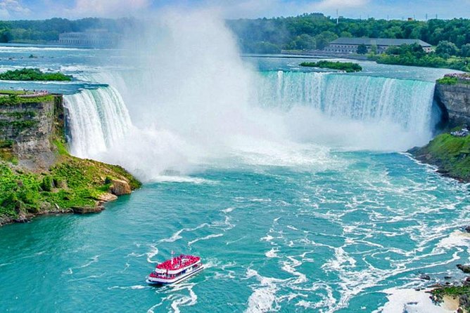 The Horseshoe Falls from the Canadian bank, a tour boat in the basin below