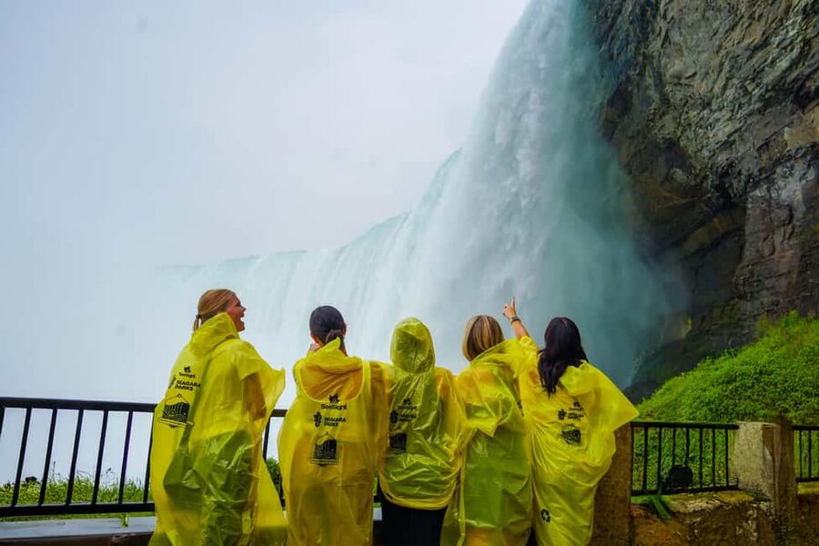 Niagara Falls Tour: Skylon, Journey Behind Falls & Boat Ride - Walking beside the Canadian Falls
