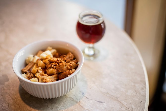 Old Montreal Guided Food Tour with 8+ Local Delicacies Tastings - Smoked meat poutine at Franklin’s Subs Suds