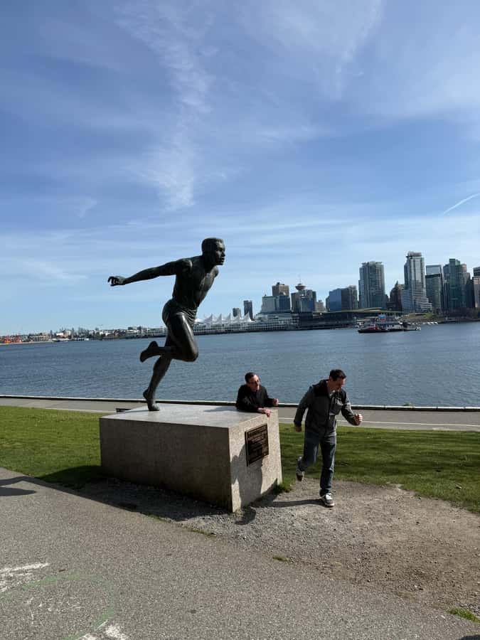 Stanley Park CarTour:SmallGroup/Comfort&CheaperThan BikeTour - Brockton Point Lighthouse and park statues
