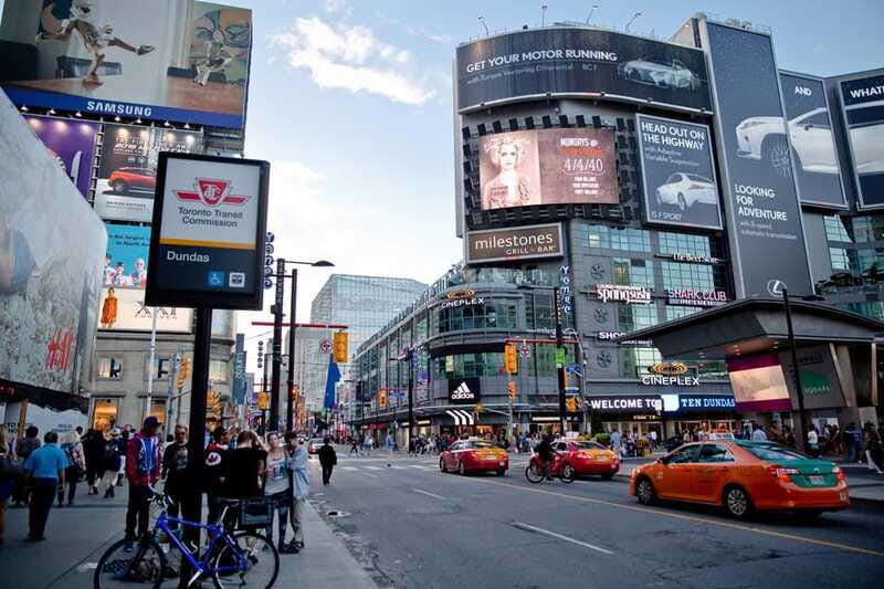 Toronto: Small Group Night Tour with Harbour Boat Cruise - Downtown sights from Yonge-Dundas Square to the Toronto Sign