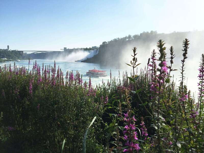 Toronto to Niagara Falls: Boat Ride & Behind the falls Tour - Riding into the mist on the Canadian cruise
