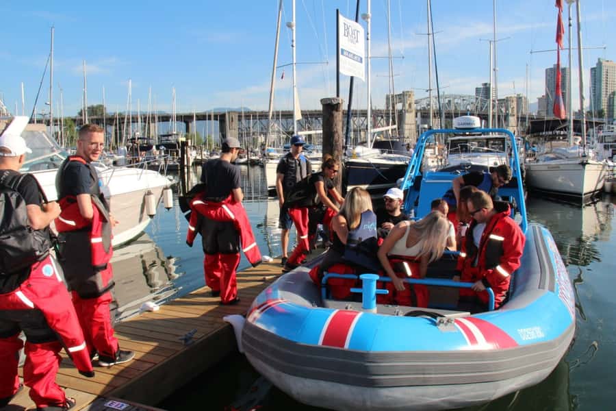 Vancouver: City and Seal Boat Tour - Under Lions Gate Bridge