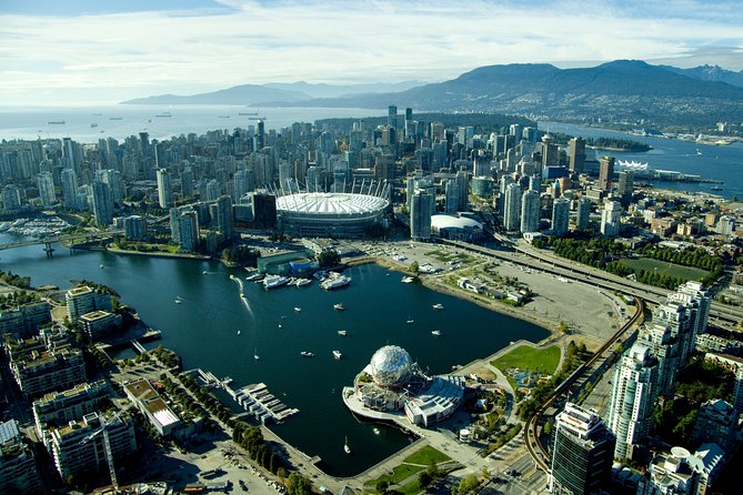 Vancouver Tour: Stanley Park, Granville Island & Capilano Bridge - Canada Place and the downtown opening
