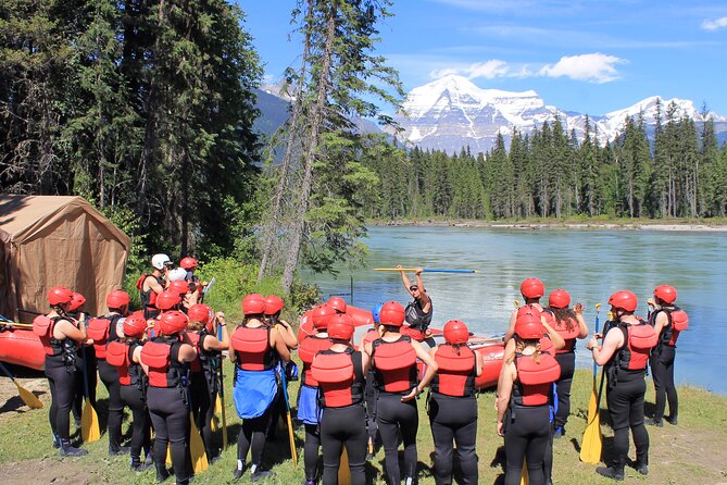 Whitewater Rafting on Jasper's Fraser River - Carrying the raft around Rearguard Falls